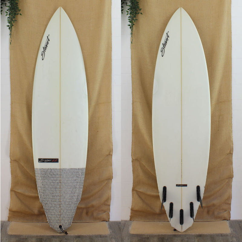 Deck and Bottom view Of a USED Stewart S-Winger white with Carbon Fiber tail patch 