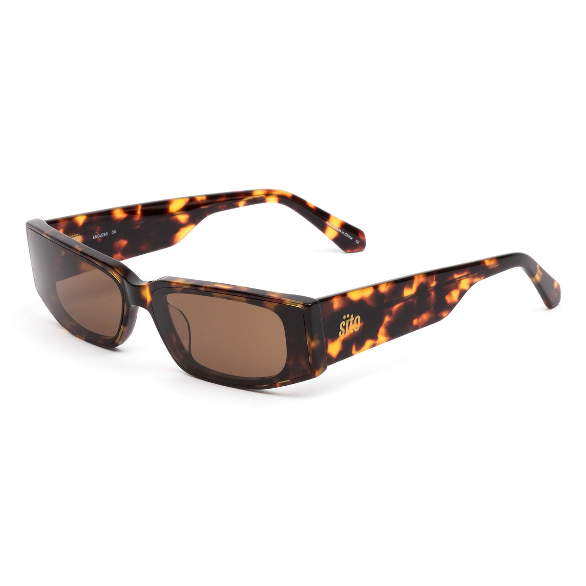 SITO round eyeglasses with a patterned frame, featuring amber-colored lenses.