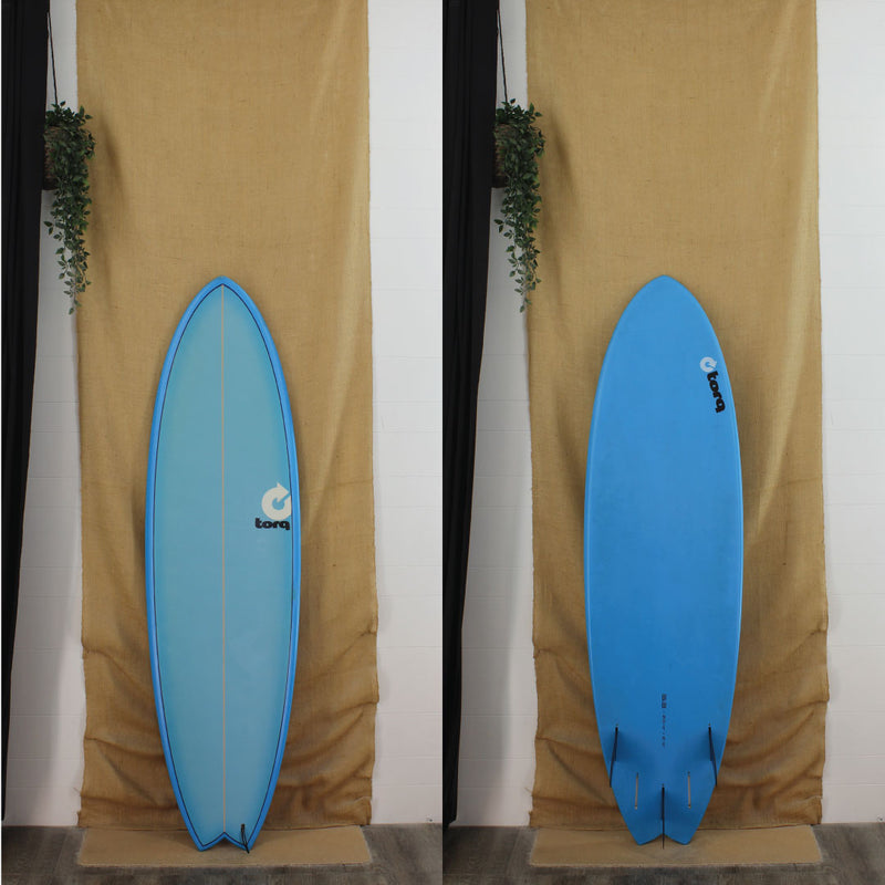 Deck and bottom view of a used Torq Fish Shortboard with Blue paint
