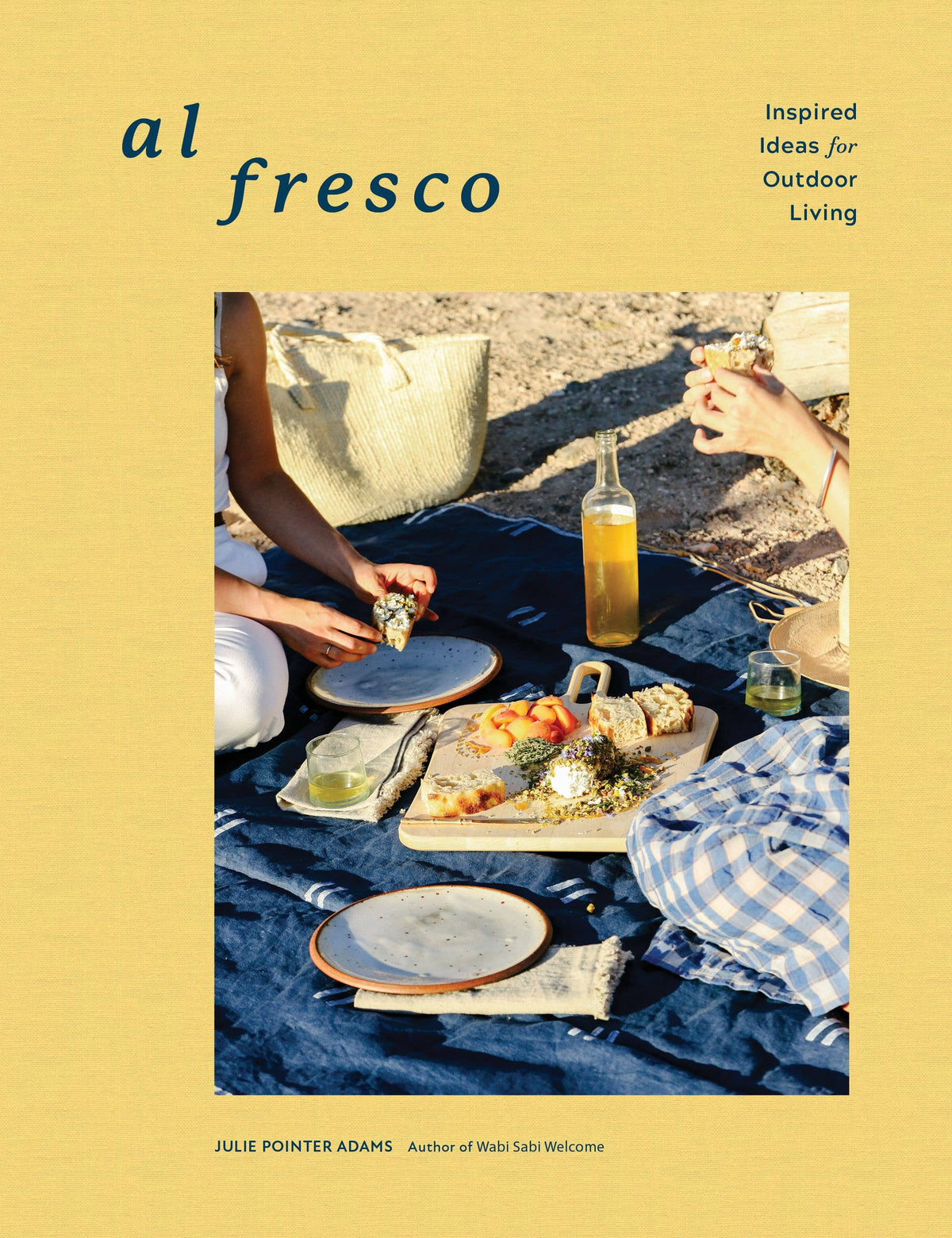 Book cover of 'al fresco' with people enjoying a picnic on a blue blanket.