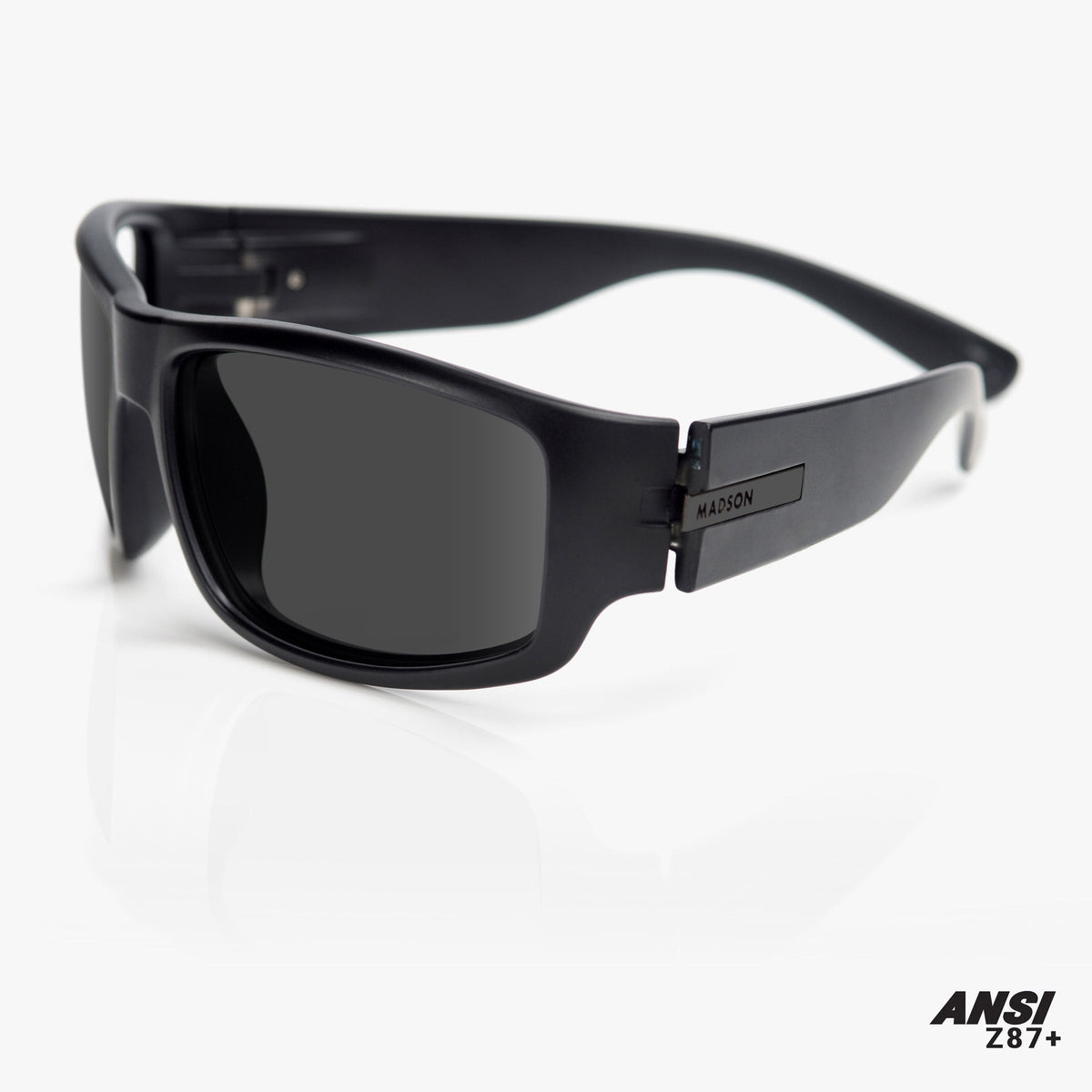 Black sunglasses with a clear background and 'ANSI' branding.