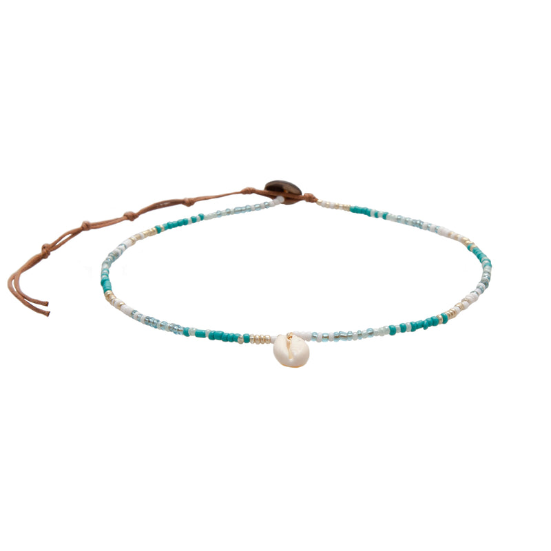 Necklace with beads and a pearl pendant on a white background