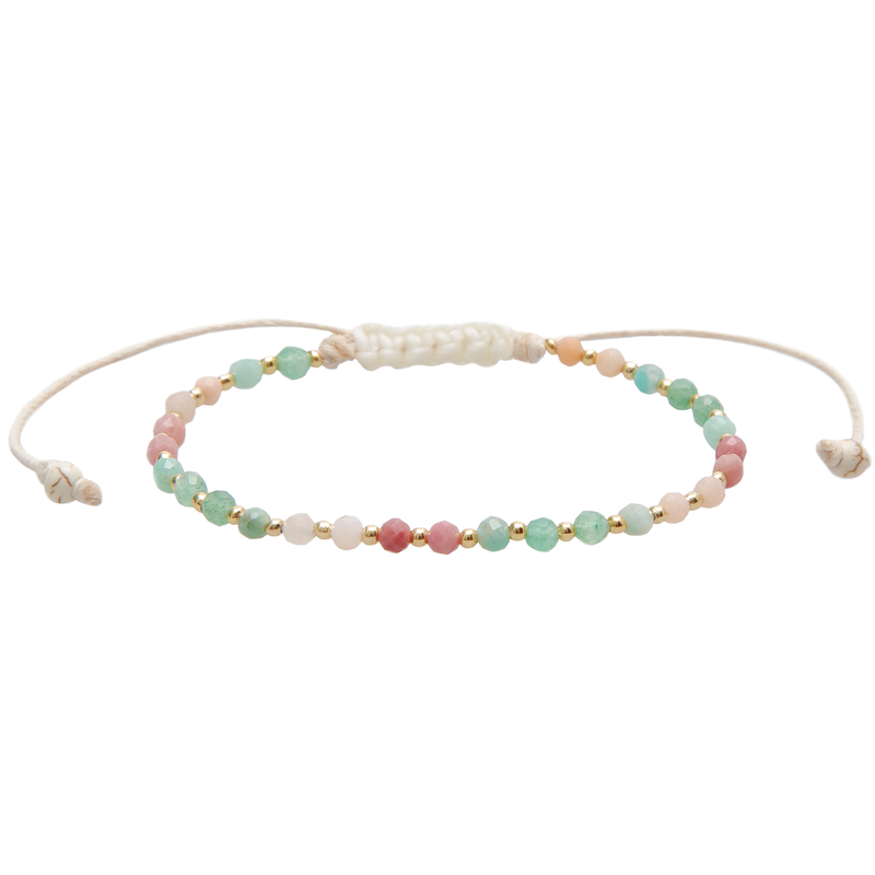 Beaded bracelet with multicolor beads on a white background