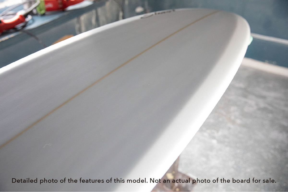 detail view of the rail of a Stewart 949-Comp midlength surfboard