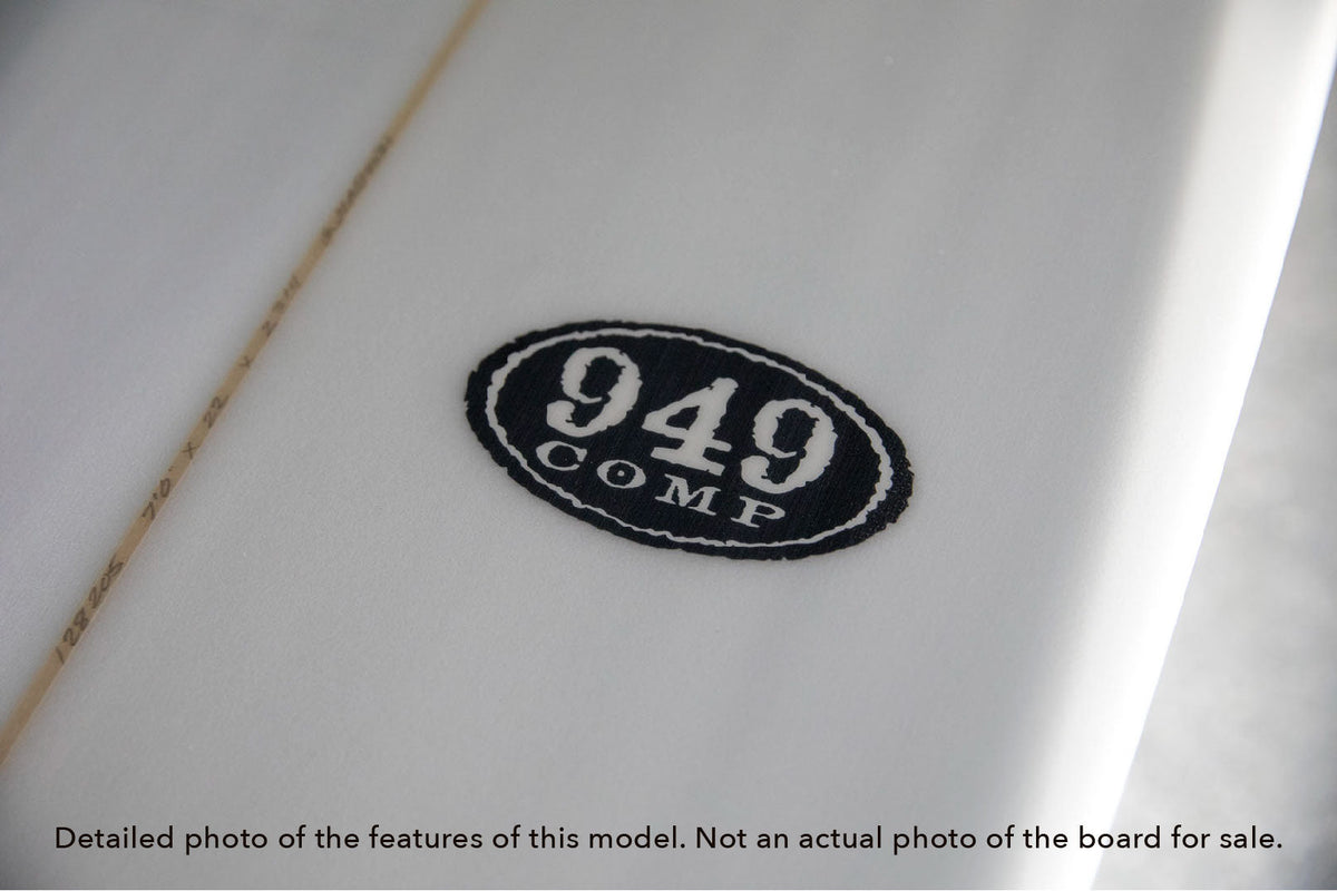 detail view of the logo of a Stewart 949-Comp midlength surfboard