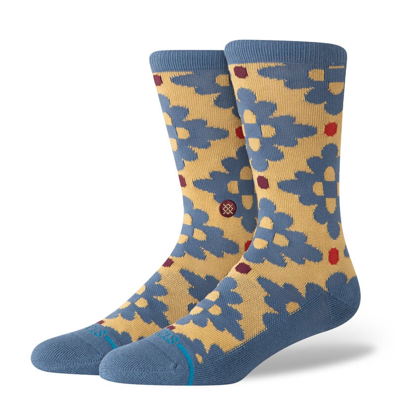 Stance Socks. Pair of socks with floral pattern on a white background
