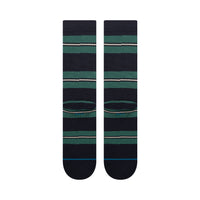 Pair of black socks with green and white striped pattern on a white background
