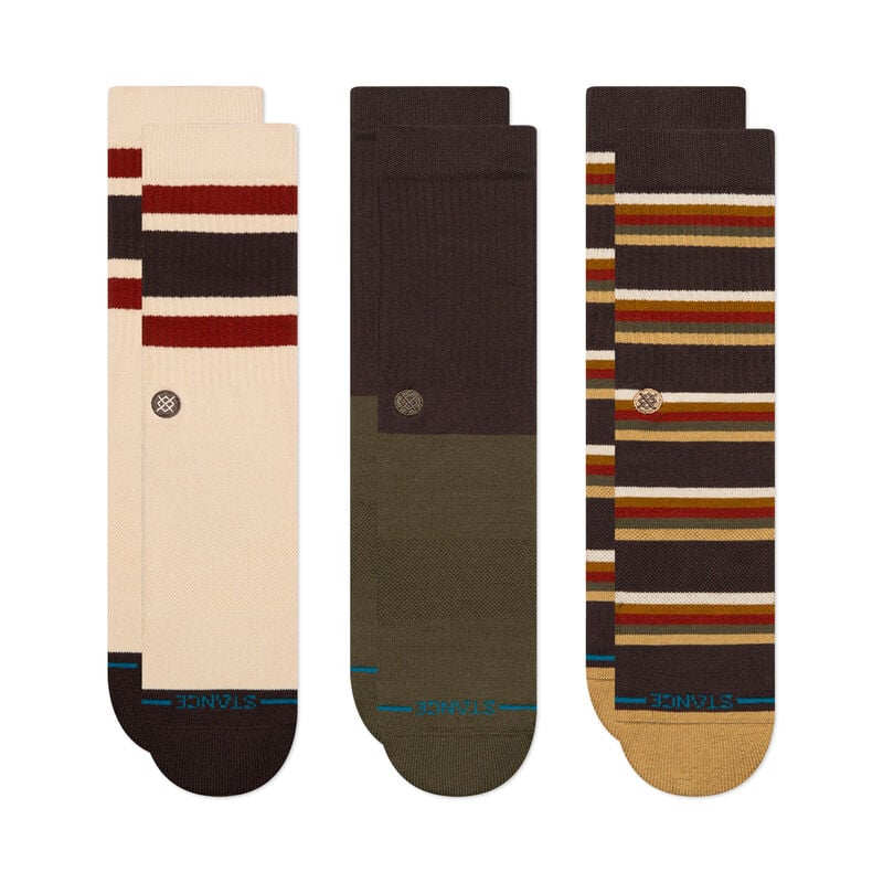 Three pairs of striped socks on a white background