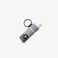 Keychain with striped design and logo on a white background