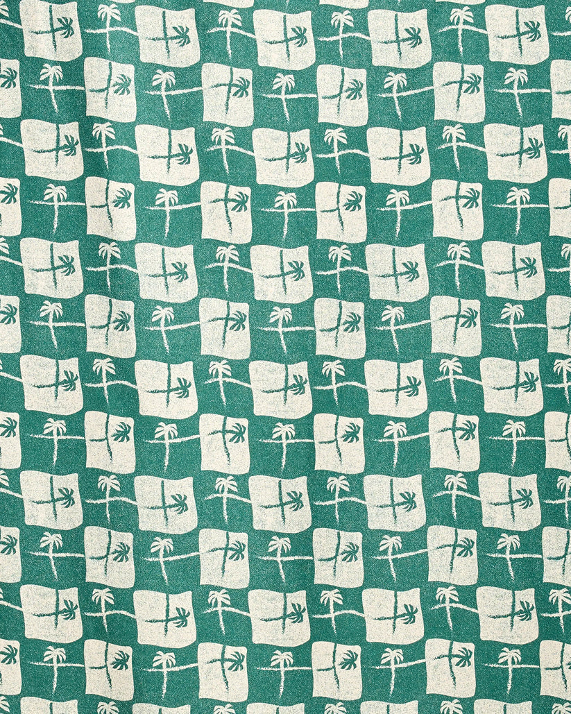 Pattern of white squares with palm trees on a green background