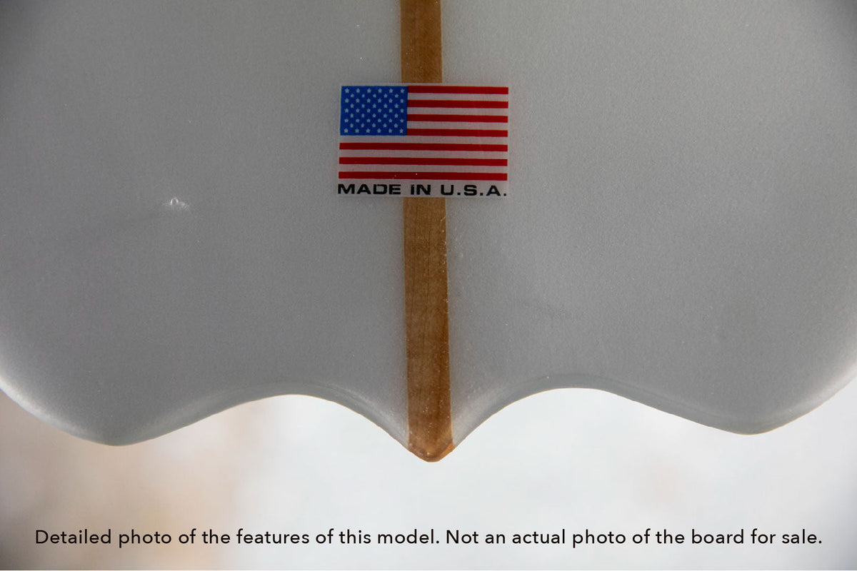 detail of the Made in the USA laminate on the tail of the Bird single fin longboard