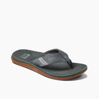 Gray sandal with brown sole on a white background