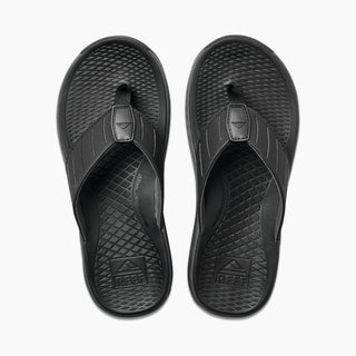 A pair of black REEF DECKHAND men's sandals with siped rubber grooves and a quick-dry lining.