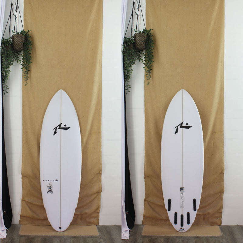 top and bottom view of rusty shortboard
