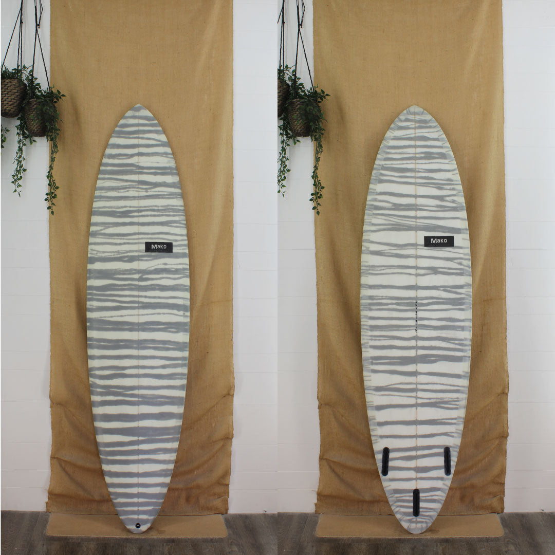 Deck and Bottom view of a mako mid length with  white and grey resin work and a sand finish 