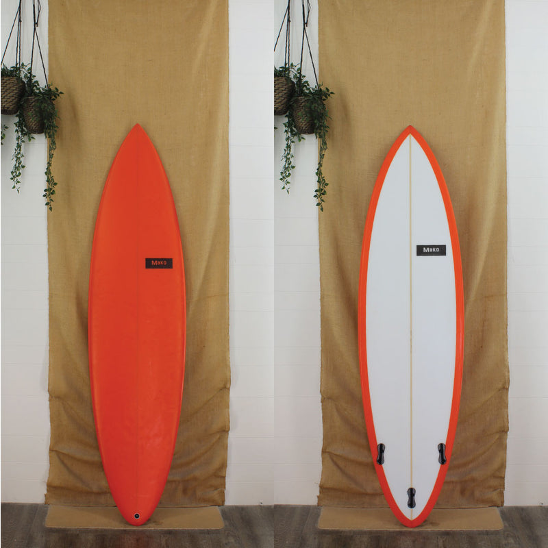 Deck and Bottom view of a mako 7'0" with orange resin work on the top and a clear bottom sand finish 