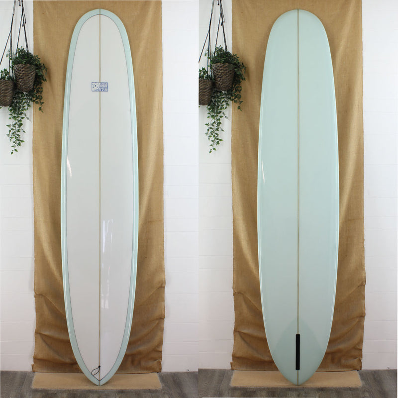 joel tudor longboard pintail with seafoam bottom and rails and gloss polish