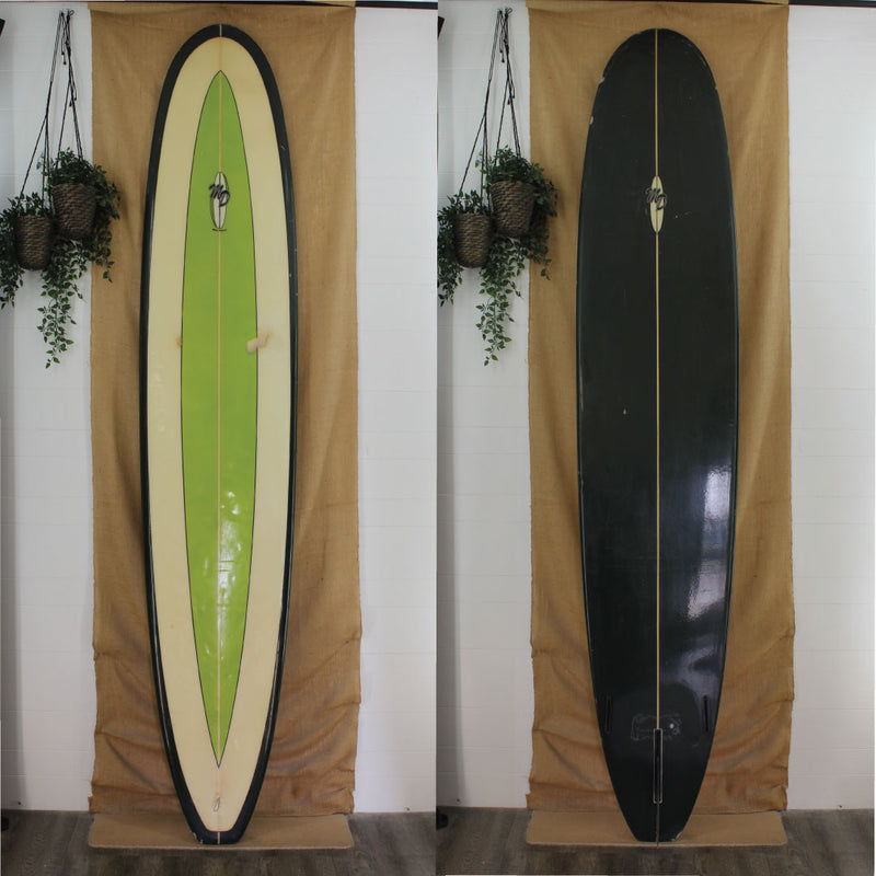 Deck and Bottom View of a used Mike Dawson Longboard with a green oval on the deck and a green bottom and rails gloss and polish finish 