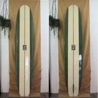 Deck and bottom view of a Christensen longboard with forest green  panels on the rails with off white panels in the center. Skull logo in the center of stringer.