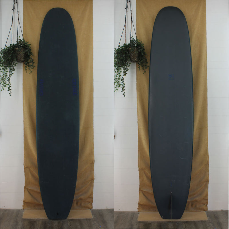 Deck and Bottom view of a crime soft top longboard the color is a very dark grey