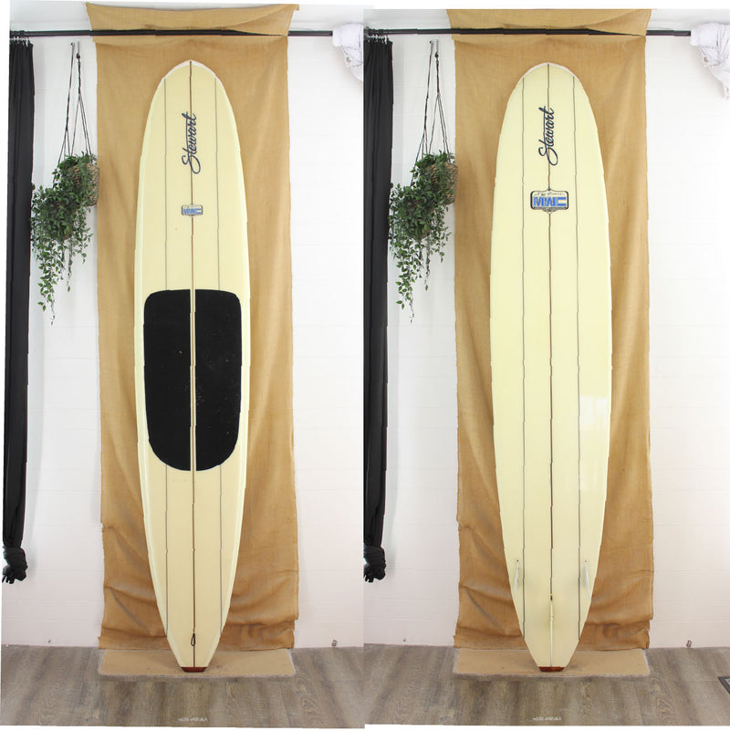 USED Stewart MWC 9'3" x 23" x 3" triple stringer with a black foam deck patch no color work
