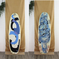 deck and bottom view of used Shuler Shortboard with blue and black artwork on the deck and bottom 