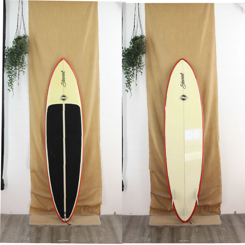 USED Stewart 7'2" x 21" x 2 3/4" with red rails and a black deck path