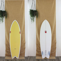 FCD Poly twin fin with yellow resin tint deck panel 