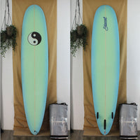 stewart redline 11 long board with blue to green fade both sides and 12" yin yang on deck 