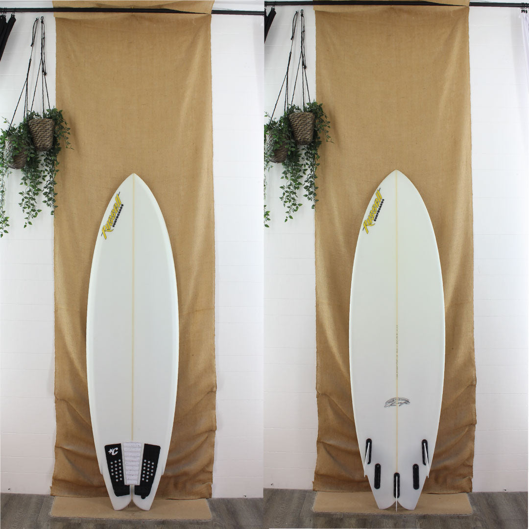 used clear russel shortboard with fins and traction 