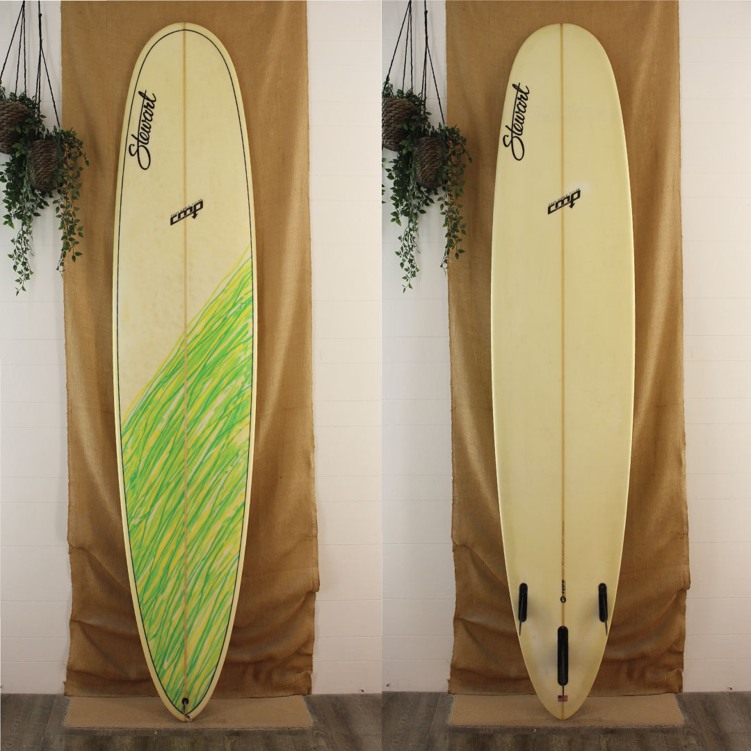 USED Stewart CMP longboard 9'2" x 23 3/4" x 2 3/4" EPS with green and yellow streaks across tail to mid board on the top deck 