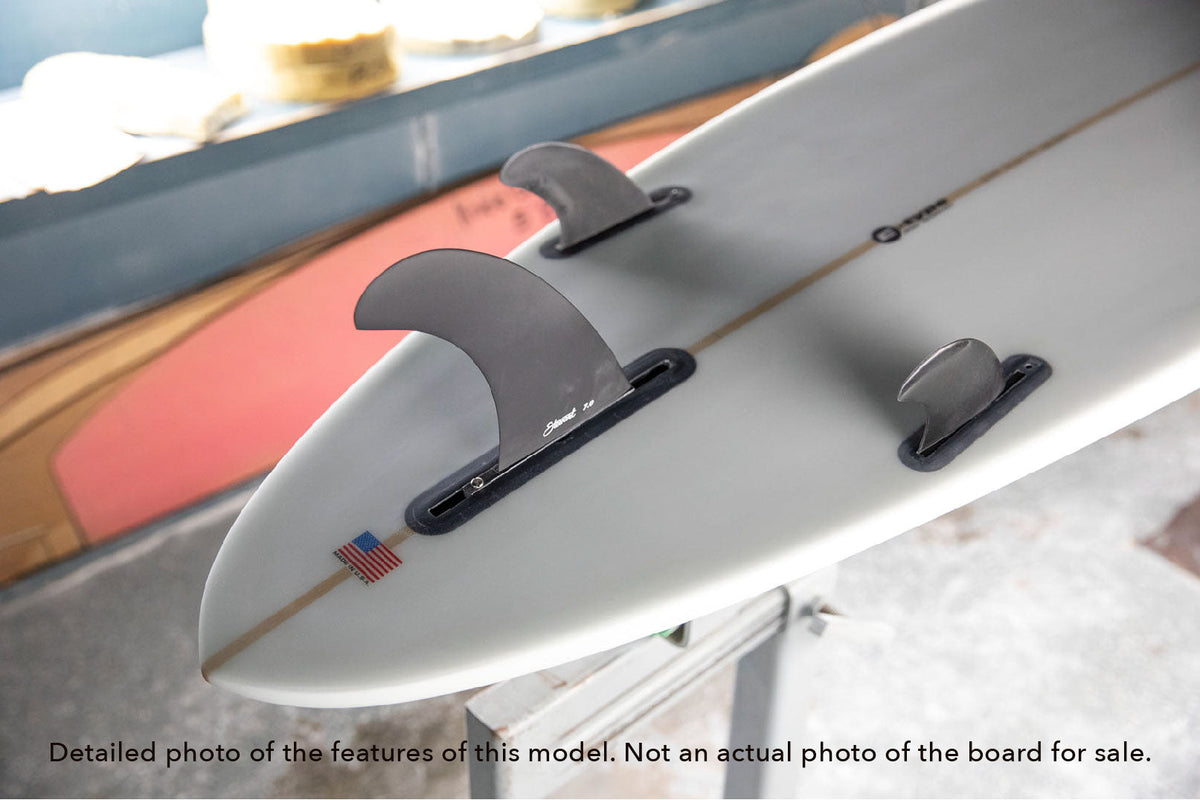 detail of the tail and fins included with a Stewart Clydesdale high performance longboard