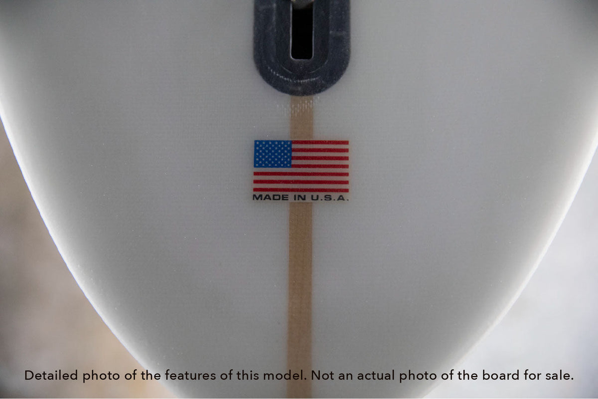 detail of the Made in the USA laminate on the tail of a Stewart Clydesdale high performance longboard