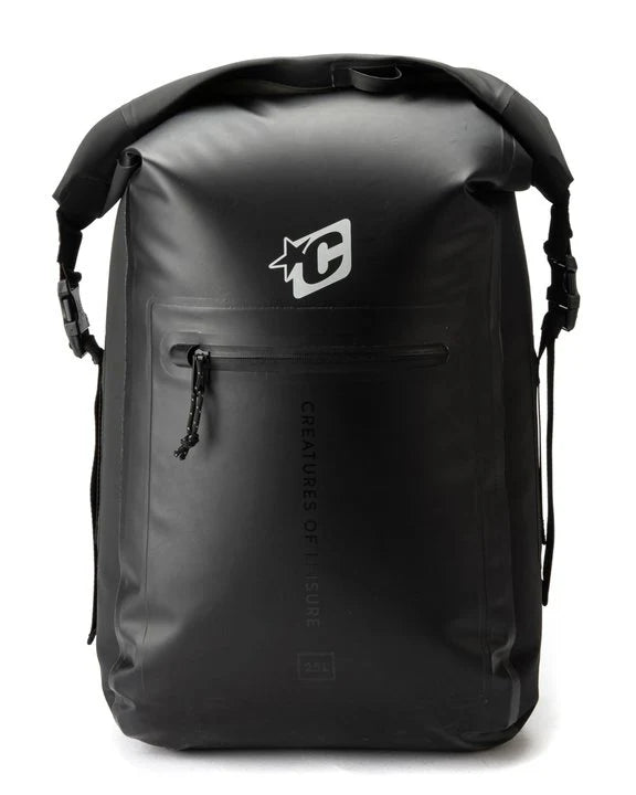 A black waterproof roll-top backpack with a white 'YC' logo on the front, a horizontal zippered pocket, and vertical branding text, shown on a white background.