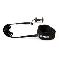 A black FCS bodyboard leash with a stainless steel swivel, heavy-duty webbing, and a padded bicep strap.