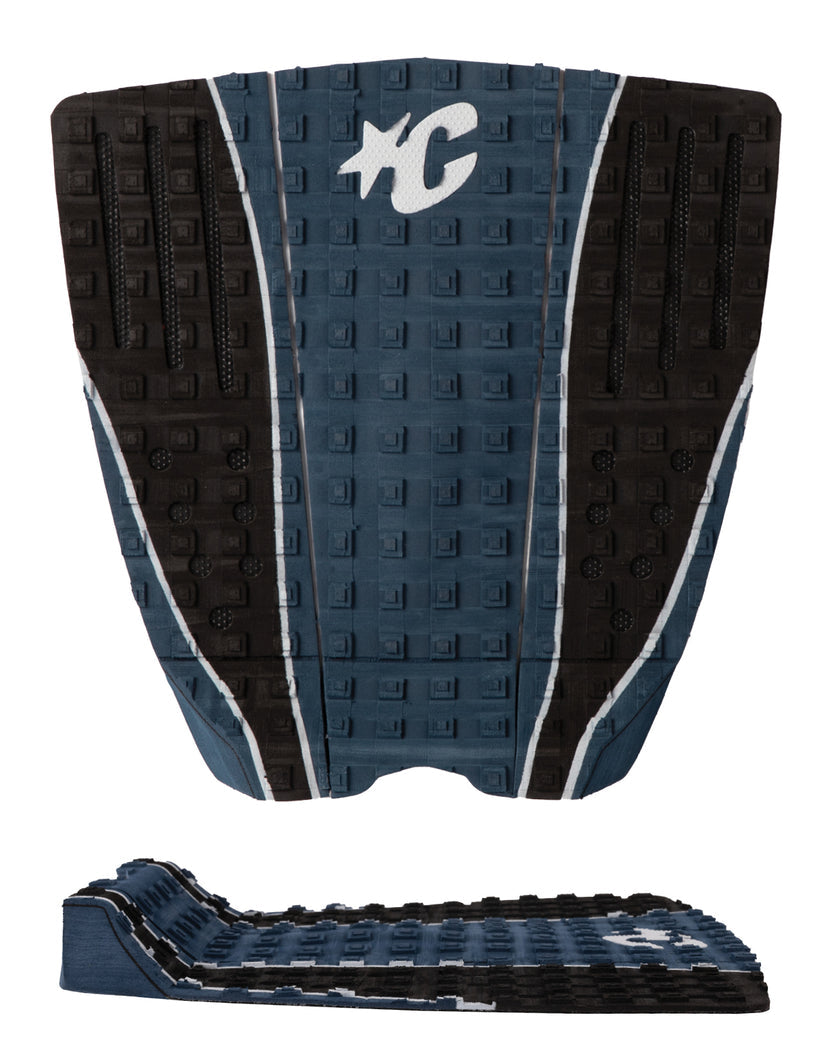 Blue and black textured surfboard tail pad with a logo on a white background