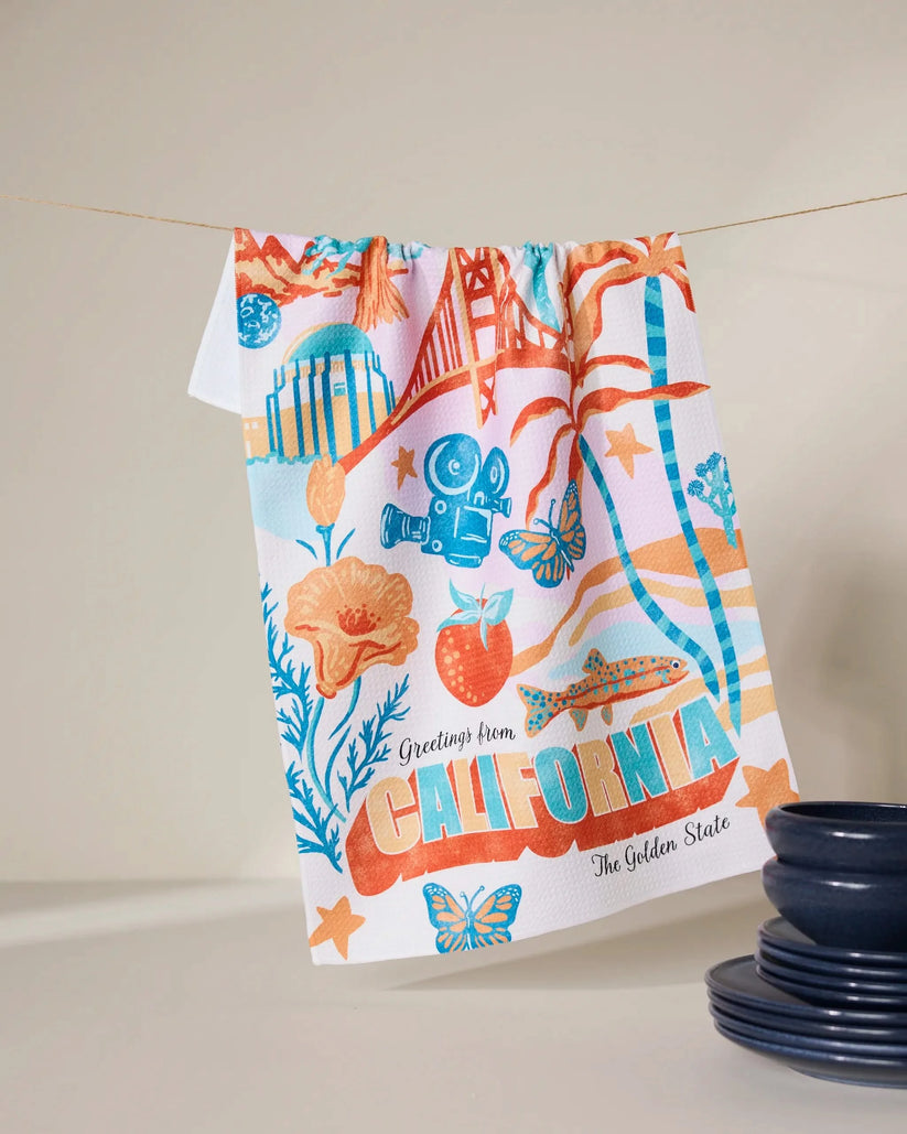 Colorful towel with California-themed design on a neutral background