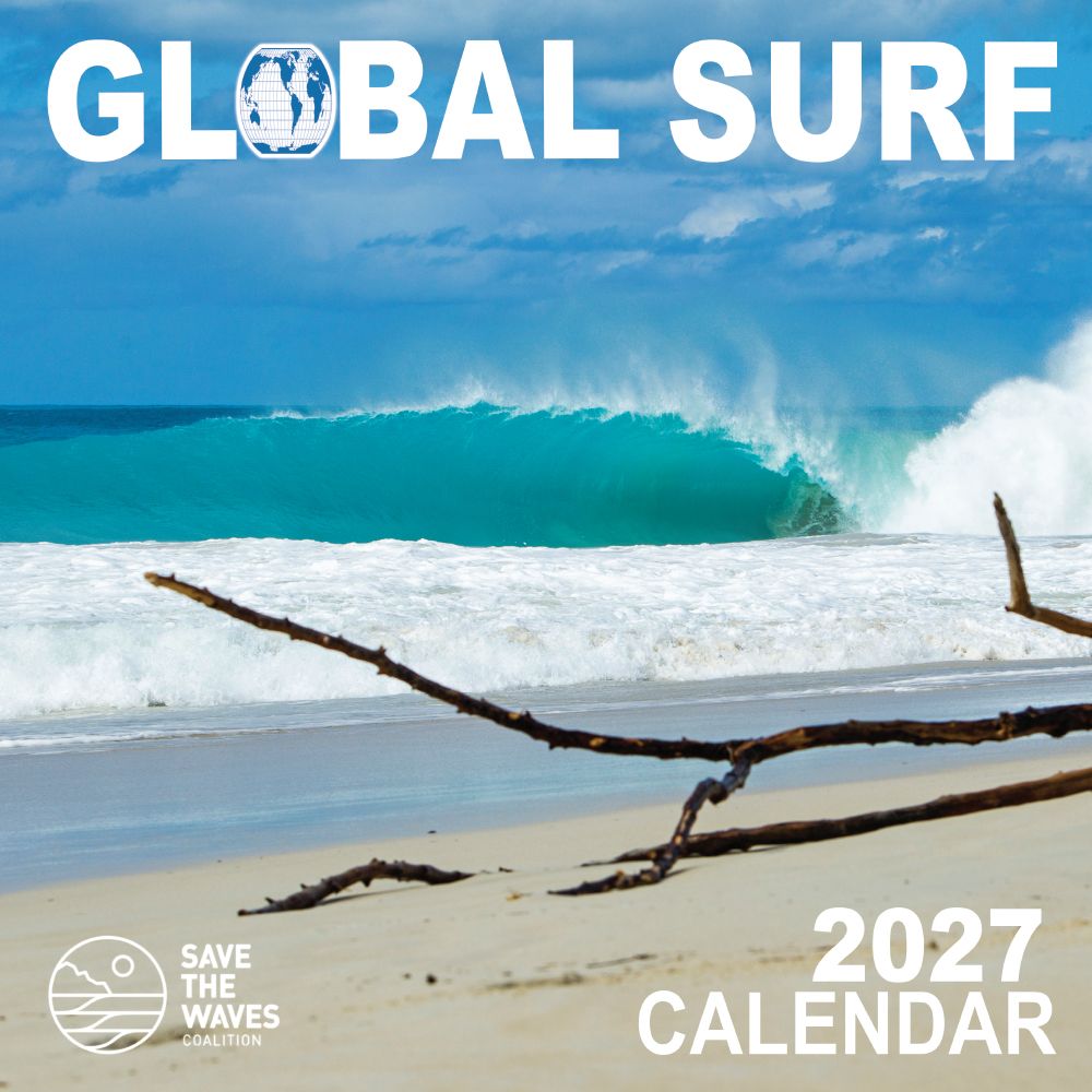 2027 Global Surf Calendar cover featuring a beach scene with a turquoise ocean wave, white surf, sandy shore, and driftwood. Large white text at the top reads 'GLOBAL SURF' and at the bottom right reads '2027 CALENDAR'.