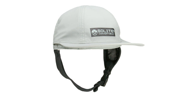 White surf hat with black chin strap on a white background