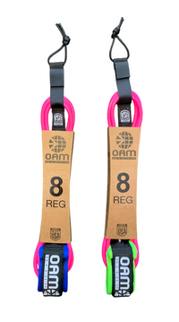 Two OAM surfboard leashes with pink accents on a white background