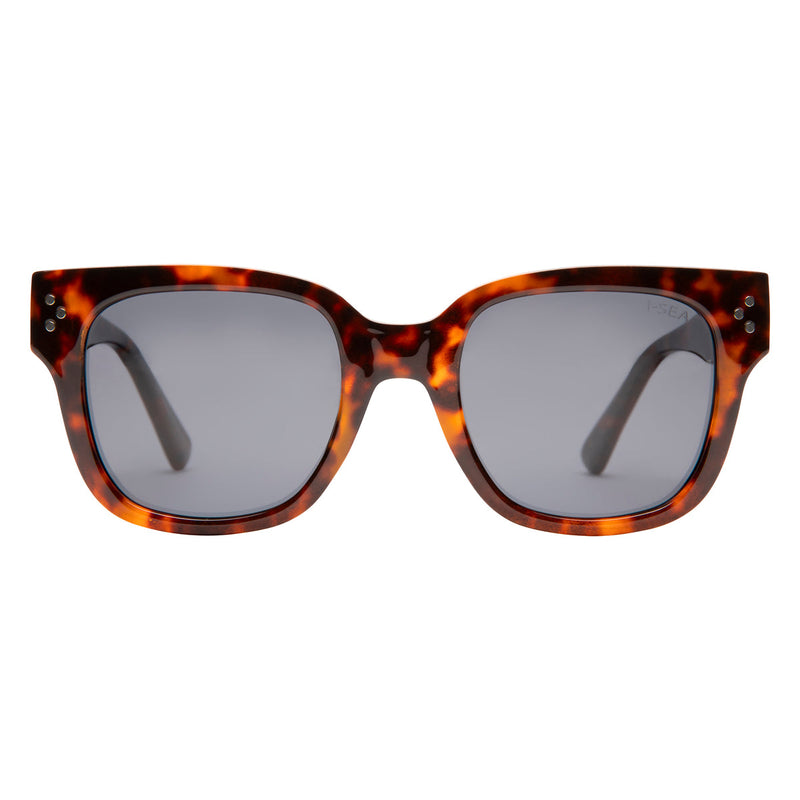 Sunglasses with tortoiseshell frame and dark lenses on a white background