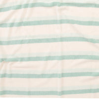 Close-up of fabric with light blue and white horizontal stripes.