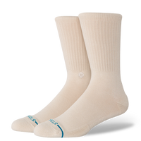 Pair of beige socks with a brand logo on a white background