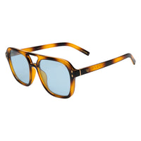 Tort sunglasses with gold accents on a white background