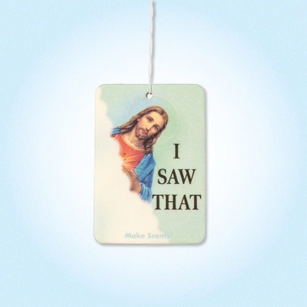 Air freshener with a religious figure and 'I Saw That' text on a light blue background