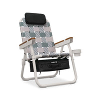 Checkered folding chair with a black pillow on a white background