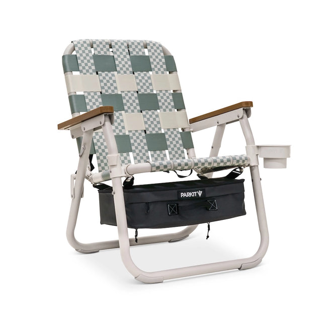 Checkered folding chair with a backpack attachment on a white background