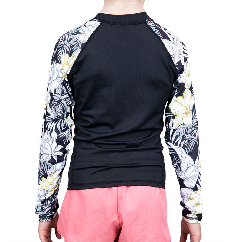 Front view of girls black rashguard with floral print sleeves