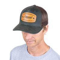 STEWART SHAPING STOKE OLIVE BADGE TRUCKER HAT