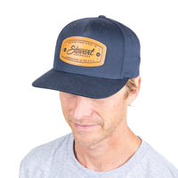 STEWART NAVY LEATHER BADGE ADJUSTABLE HAT